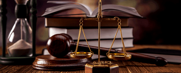 Scales of justice, law books and gavel