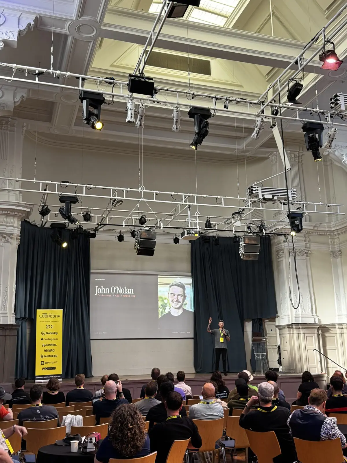 John O.Nolan of Ghost.org on stage at LoopConf 2025