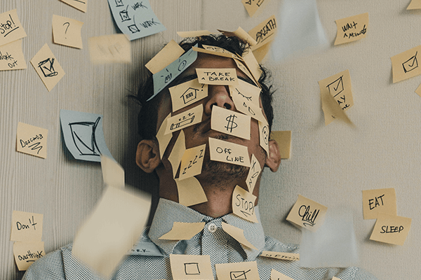 A man with lots of post-it notes