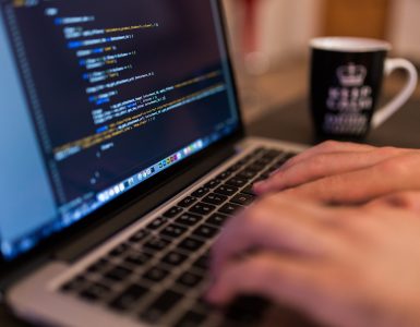 Coding on a laptop screen