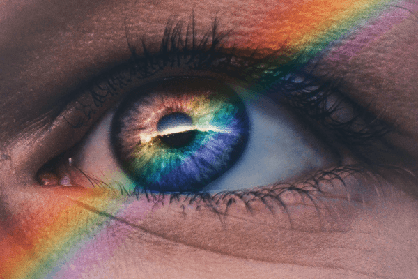 A human eye and a rainbow