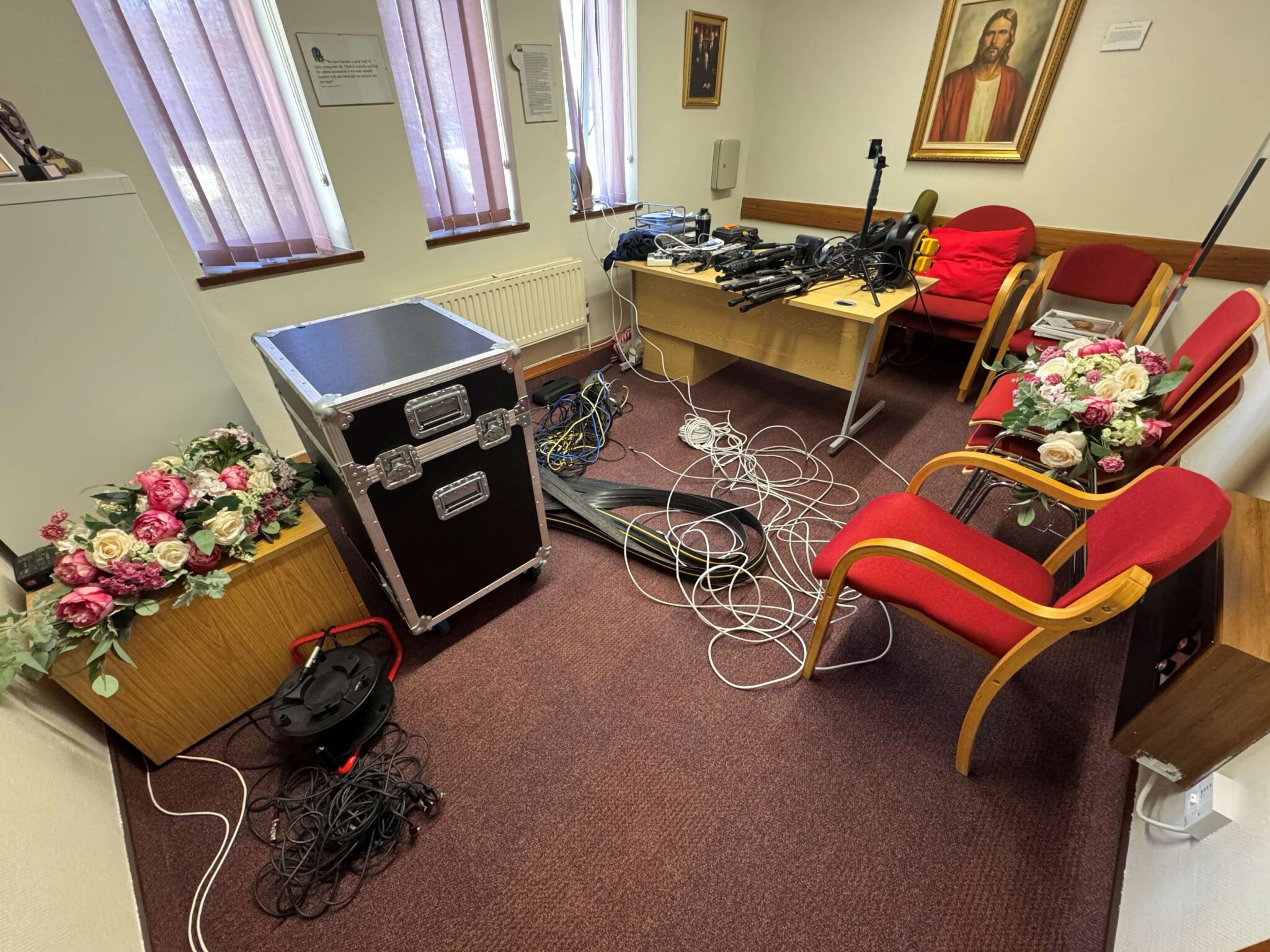 Mess of cables, tripods and various equipment following a broadcast